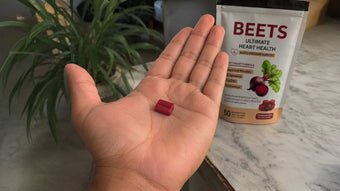 image of a hand opened with a beet chew on its palm