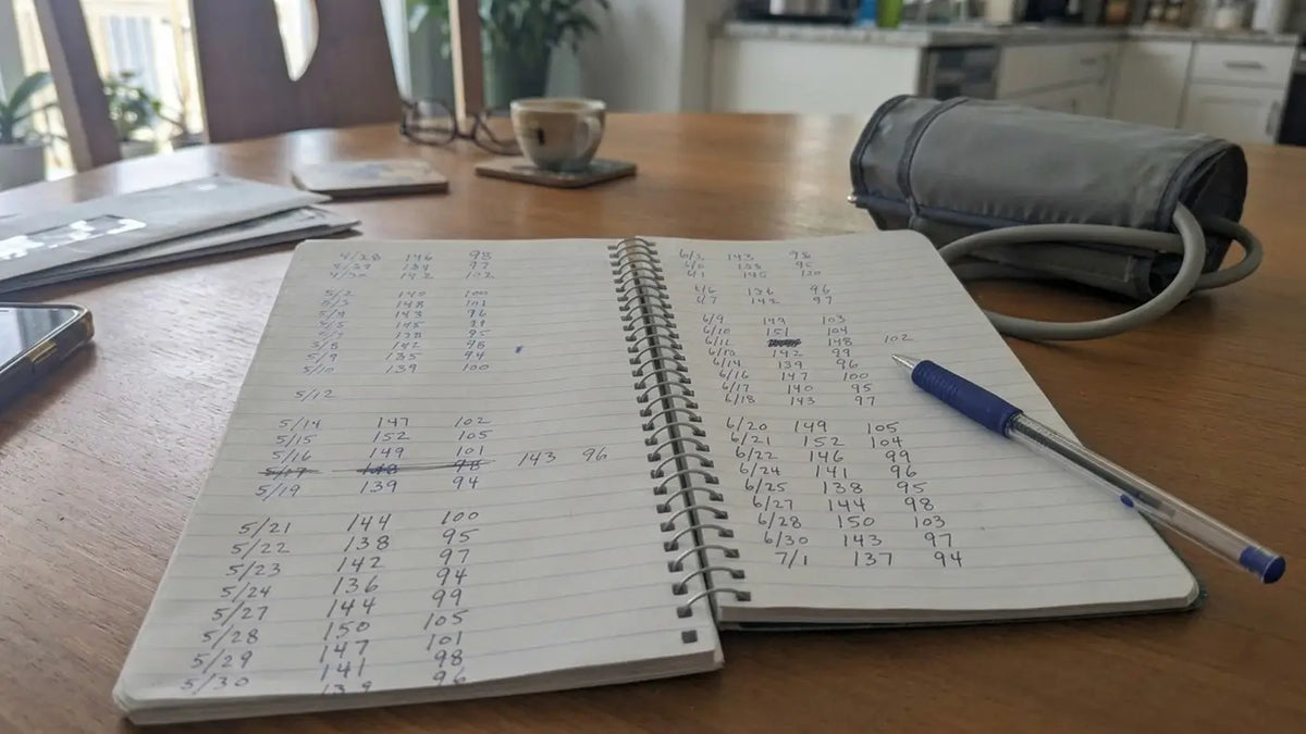 Almost a year of readings, twice a day, in my own handwriting. I kept every one. The line never actually moved.